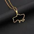Macro shot of gold Ukraine map outline pendant on a stainless steel chain - Hollow Map Style (金色项链C) / Gold