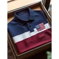 Premium men's navy and burgundy color-block polo shirt with US flag patch in gift box. - S / Navy + Red