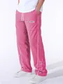 Detail showing men's pink sports pants with white star embroidery and side stripes - Hot Pink