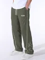Detail of men's olive green sports pants with white star embroidery and side stripes - Olive Green