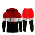 Herren-Trainingsanzug mit Kapuze und Jacquard-Struktur im herbstlichen Farbblock-Design - S / Rot Weiß Schwarz Patchwork