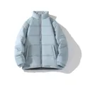 Detailed view of a light blue unisex winter puffer jacket with a padded stand-up collar. - S / Light Blue