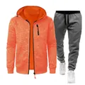 Detailed view of the men's sports set featuring a textured jacquard hooded jacket - S / Orange (Top) And Dark Gray (Pants)