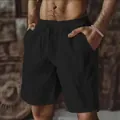 Breathable solid black cotton linen shorts for men featuring a casual hip-hop style - S / Black