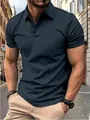 Detail view of a men's slim fit navy short sleeve polo shirt in a street setting - Dark Gray