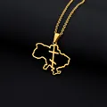 Macro detail of gold Ukraine map pendant with trident cross on black textured background - Map Cross Style (金色项链F) / Gold