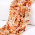 Irregular carnelian beads in vibrant orange and yellow tones for DIY jewelry making - Natural Red Agate