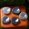 Collection of polished natural grey agate heart-shaped worry stones for massage and healing - 30MM / Grey Agate