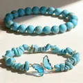 Elegante set di bracciali in turchese blu con perle tonde da 8mm e ciondolo a farfalla - Turchese Blu Naturale