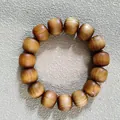 Handcrafted wooden barrel bead bracelet featuring natural tiger-skin wood grain textures - Thuja Wood Barrel Style / 15mm*15 Beads / Natural Wood Color