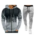 Close-up detail of men's grey paint splatter zip-up hoodie and matching casual joggers - Light Gray