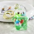 Adorable green acrylic liquid-filled bunny keychain with gold keyring for school bags - Bell Style - Green