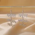 Boucles d'oreilles pendantes festives argentées Happy New Year avec étoiles pour femmes - Style d'Etoile de Lettre HAPPY NEW YEAR Argentée (13)