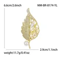 Elegante spilla a foglia con zirconi gialli micro-pavé e dettaglio perla bianca - Oro Giallo