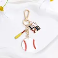 Handcrafted baseball themed keychain featuring LOVE charm and bat for sports enthusiasts - Gold Baseball Bat Word Disc Style