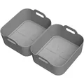 Detailed view of two square gray silicone air fryer liners with durable side handles - Dual Basket Grey