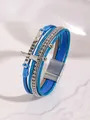 Detail view of blue multilayer PU leather bracelet with silver cross and magnetic buckle - Sapphire Blue