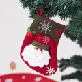 Traditionelle Weihnachtssocke aus Filz mit Weihnachtsmann-Motiv als festlicher Geschenkbeutel - Rustikaler Weihnachtsmann