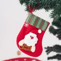 Festive red Christmas stocking gift bag with 3D Santa Claus appliqué and Merry Christmas text - Striped Santa