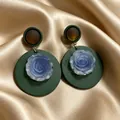 Elegant retro vintage dark green earrings with blue rose detail on satin silk background - Green Wooden Rose Earrings (2606005)