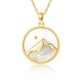 Close-up of gold stainless steel necklace featuring a mountain and sun pendant design. - Gold