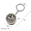 Silver car wheel rim keychain pendant with product dimension details - Wheel Hub Keychain Silver