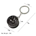 Creative black car wheel rim keychain tuning accessory for car enthusiasts with dimensions - Wheel Hub Keychain Black