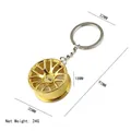 Gold car wheel rim keychain pendant with precise size dimensions and 24g net weight - Wheel Hub Keychain Gold