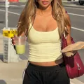 Y2K style sleeveless rib-knit crop tank top in bright yellow for summer street fashion - Yellow