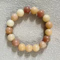 Natural bodhi root beaded bracelet in earth tones featuring smooth round beads - Charred Bodhi Single Loop Style