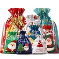 Set of assorted colorful Christmas drawstring gift bags featuring festive Santa and tree designs - Christmas Gift Bag Assortment Set