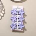 Set of six purple frangipani flower hair claw clips displayed on a white display card. - 4cm Frangipani Style / 6-Piece Set / Matte Purple / Bulk Packaging