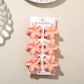 Set of six elegant peach plumeria flower hair claw clips for women's hairstyling - 4cm Frangipani Style / 6-Piece Set / Glossy Korean Pink / Bulk Packaging
