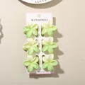 Set of 6 green gradient frangipani flower hair claw clips for women on a display card - Splatter Pattern Frangipani Clip / Bulk Packaging / 6-Piece Set (4cm) / #2 Yellow-Green Gradient (Frangipani White Splatter)