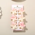 Set of six pink and white gradient plumeria flower hair claws on a pink accessories card - Splatter Pattern Frangipani Clip / Bulk Packaging / 6-Piece Set (4cm) / #1 Yellow-Pink Gradient (White Splatter)