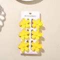 Set of 6 bright yellow plumeria flower hair clips presented on a white display card - 3.5cm Glossy Five-Petal Style / Set of 6 / Bright Yellow / Bulk Packaging