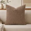 Textured brown bubble grain throw pillow cover displayed on a minimalist beige sofa - No. 11 Camel