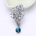 Elegant feather-shaped brooch with multi-color rhinestones and a large blue crystal - Feather Pendant (XH-1405) / Violet Blue