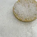 Clear transparent glass seed beads for DIY jewelry making displayed on a wooden tray - Transparent 101