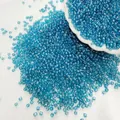 Small iridescent blue glass seed beads in 2-3mm size for DIY jewelry making crafts - Blue 103