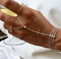 Elegant silver slave bracelet hand chain featuring sparkling rhinestones on a female hand. - Three-Layer Chain Bracelet Style (#114) / Silver