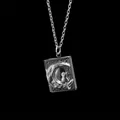 Vintage silver-tone book locket necklace featuring a cat on a crescent moon pendant - Moon Cat Book Locket (AQ-6507)