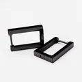 A macro detailed view of minimalist black titanium steel rectangular hoop earrings - Rectangle Black (Single Piece)