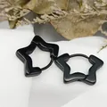 Macro view of glossy black star-shaped hoop earrings on minimalist textured white fabric - Four-pointed Star Black (Single Piece)