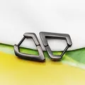 Macro detail view of gunmetal black geometric trapezoid earrings crafted from titanium steel. - Diamond Shape Black (Single Piece)