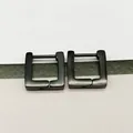 Macro detail shot of sleek black titanium steel square hoop earrings for men and women - Square Black (Single Piece)
