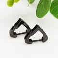 Detail view of black heart-shaped titanium steel hoop earrings on white background - Heart Shape Black (Single Piece)