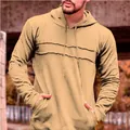 Detail view of men's khaki casual hoodie featuring raw-edge stitching and drawstring hood - M / Apricot
