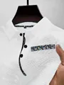 Close-up of white mesh ice silk polo shirt featuring intricate paisley trim detail - S / White