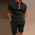 Close-up detail of men's slim-fit black polo shirt set with red contrast collar and zip - Black-Red Contrast